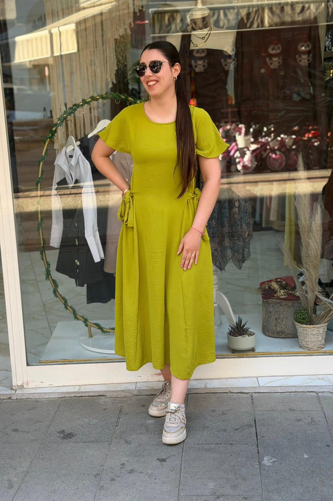 BEL BAĞLAMA DETAYLI ŞIK VE AKICI ELBİSE